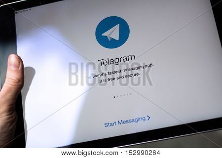 Moscow Russia - October 23 2016: Telegram application on iPad display. Telegram is a cloud-based instant messaging service