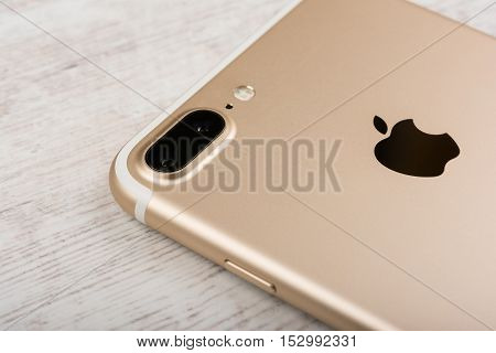 BURGAS, BULGARIA - OCTOBER 22, 2016: New Apple iPhone 7 Plus Gold on white background, back side, illustrative editorial.