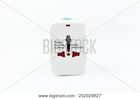 Universal Travel Adapter Plug. Isolated On White Background. For Travelers To Many Countries. Need A