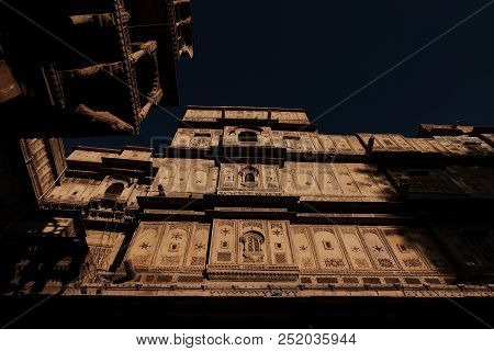 Ancient Building With The Sky From The Bottom View