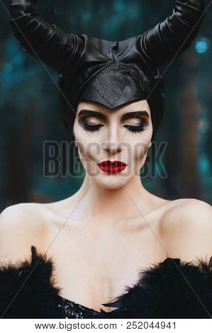 Portrait Of Beautiful And Fashionable Brunette Slim Model Girl, With Bright Makeup And Red Lips, At 
