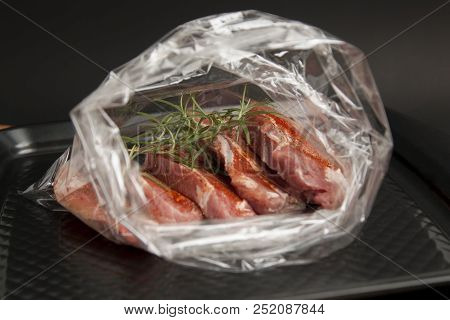 Cooking Baking Plastic Bag. No Pastic Concept. Fresh Pork Meat Steake Packaged In A Sleeve With Spic