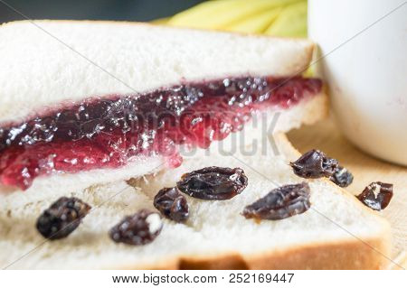 Morning Breakfast Have Brown Bread With Blueberry Jam And Currants. It Is Healthy Food And Good For 