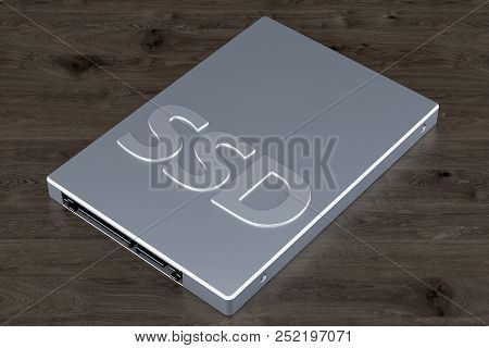 Solid State Drive Ssd On The Wooden Background, 3d Rendering