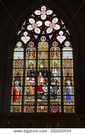 Brussels, Belgium - July 04, 2018: An Ancient Stained Glass Window In The Cathedral Of St. Michael A