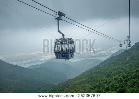 Hong Kong - May 4,2018 : The Tourists On Ngong Ping 360 Cable Car From Tung Chung Station To Ngong P