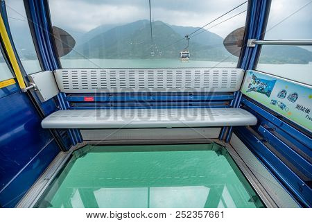 Hong Kong - May 4,2018 : The Tourists On Ngong Ping 360 Cable Car From Tung Chung Station To Ngong P
