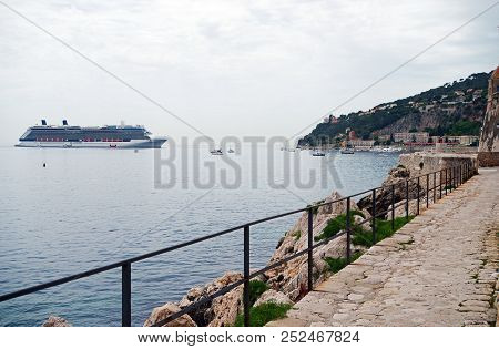 Crusie Ship Laying Off Shore In The Villefranche Harbour