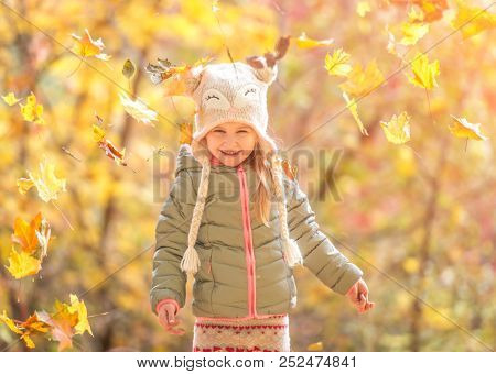 cute little girl in an autumn forest