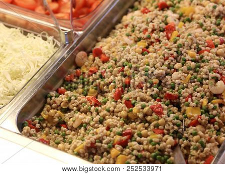 Salad With Spelled Prawns And Vegetables In The Business Canteen Tray During Lunch Break