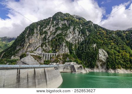 View Of Kurobe Dam In Toyama, Japan. At 186 Metres In Height, It Is The Tallest Dam In Japan.