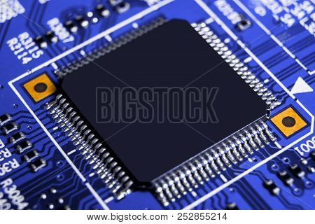 Macro Shot Of A Circuitboard With Resistors Microchips And Electronic Components. Computer Hardware 