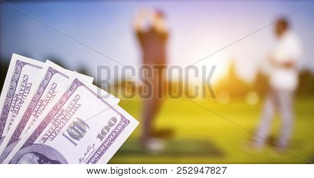 Money Dollars Against The Backdrop Of A Tv Showing Golf, Sports Betting, Money Dollars