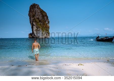 Young Men On The Beach Of Koh Poda Thailand, The Beautiful Landscape Of Koh Poda Or Poda Island In K