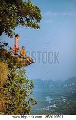 Khao Ngon Nak Nature Trail Krabi Thailand Or Dragon Crest, Couple Men And Woman Climbed To A Viewpoi
