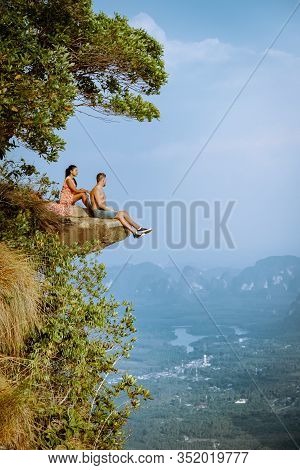 Khao Ngon Nak Nature Trail Krabi Thailand Or Dragon Crest, Couple Men And Woman Climbed To A Viewpoi