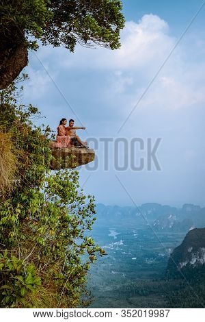 Khao Ngon Nak Nature Trail Krabi Thailand Or Dragon Crest, Couple Men And Woman Climbed To A Viewpoi