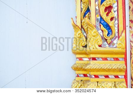 Exquisite Art On Windows Of Thai Temple. Thai Ancient Traditional Kanok Art Pattern Design Wall For 