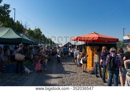 Prague, Czech Republic - May 26, 2018: Farmers Market Naplavka With People And Stallholders With Fre
