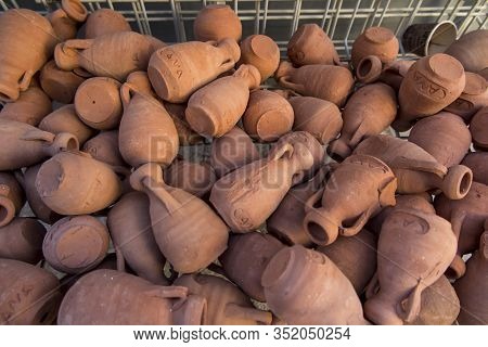 Small Clay Pots, Souvenirs From Cana Galilee In Israel, From The Place Of The Miracle Of Turning Wat
