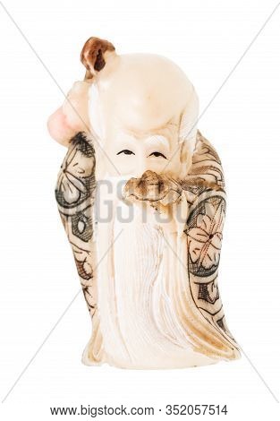 Typical Chinese Netsuke - Figurine Of Wise Man Isolated On White Background
