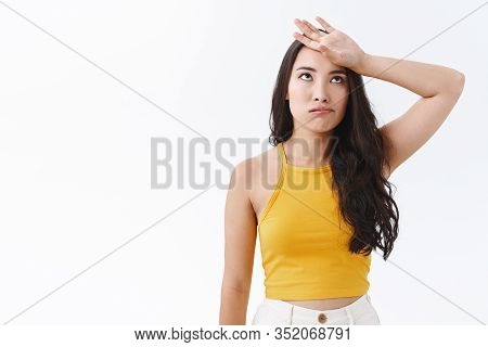 Few How Tiresome. Exhausted And Annoyed Young Woman Exhale And Wipe Sweat From Forehead, Rolling Eye