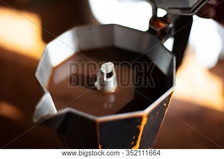 Close-up Of Coffee Moka With Sunlight And Shadows.