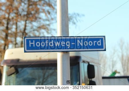 Blue And White Direction Sign On The Hoofdweg Heading To Rotterdam Nesselande And Nieuwerkerk Aan De