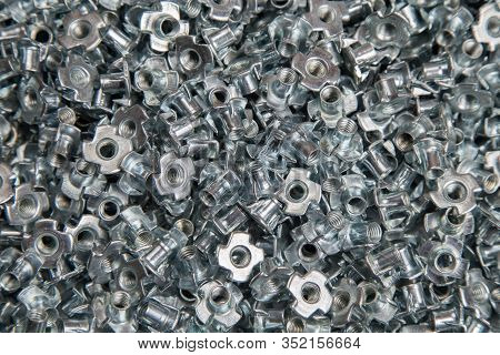Furniture Nut Persistent M6 Galvanized White In Bulk Closeup In The Studio