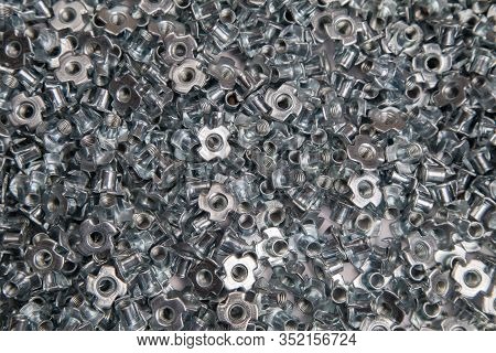 Furniture Nut Persistent M6 Galvanized White In Bulk Closeup In The Studio