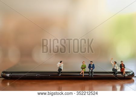 Business And Communication Cencept. Close Up Of Group Of Businessman And Woman Miniature Figure Peop