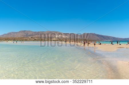 Crete, Greece - August 2019: People Have A Joy At Elafonisi Beach. Elafonisi Beach Is One Of The Mos