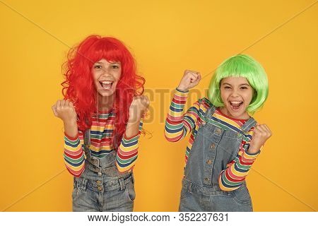 Sisters Having Fun. Semi Permanent Color Cream. Colored Clip In Hair Extensions. Change Color. Kids 