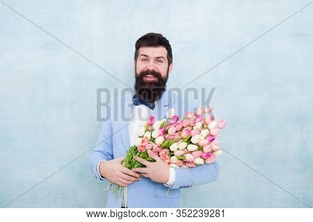 Ideas To Celebrate Without Breaking Bank. Spring Mood. Love Date. Gift Bouquet. Bearded Man Hipster 