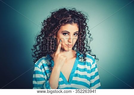 Have Shame. Closeup Portrait Serious Business Woman Teacher Unhappy Mother Touching Cheek With Index