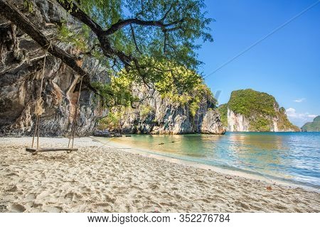 Wooden Swing Under Tree On The Beach, Scenery Of Beautiful Destination Island, Koh Lao Lading Island