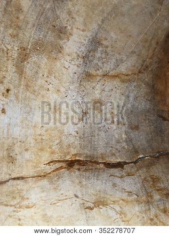 The Surface Of A Stone Wall With A Spot Of Copper Stain.