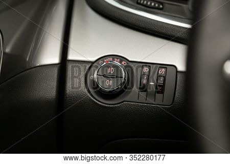 Novosibirsk, Russia - January 11, 2020:   Opel Mokka, Close-up On The Headlight Switch Control Butto