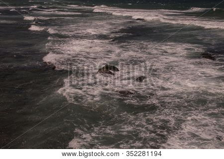 White Water Caused By Rocks In Shallows