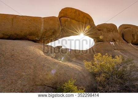 Rock Arch At Sunset In The Spitzkoppe National Park In Namibia In Africa.