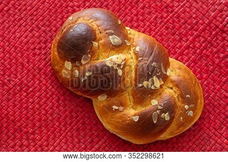 Sweet Bread, Easter Greek Tsoureki Braid On Red Background