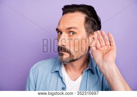 What Did You Say. Serious Man Hold Hand Near Ears Listen Private Communication Want Know Interesting