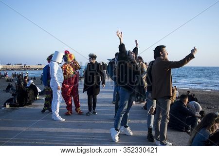Sitges, Spain - February 23, 2020: People At Last Day Of Sitges Carnival. Burial Carnestoltes - 
