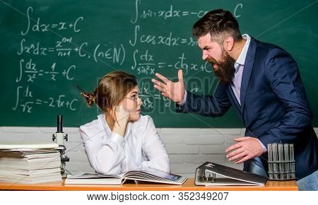 Shouting And Waving His Hands. Angry Teacher Or Student. Brutal Hipster Say Angry Words To Pretty Wo