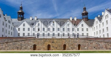 Plon, Germany - June 24, 2019: Panorama Of The Historic White Castle On The Hilltop In Plon, Germany