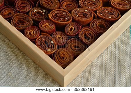 Sweet Pureed Fruit Pastille. Fruit Roll-ups Homemade. Natural Sweets From Dried Berries And Fruits. 