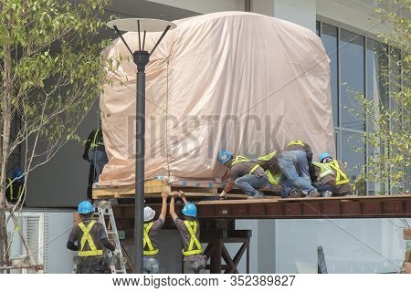 Train Head, Covering The Pink Cloth Moving By Worker Pushing From Orange Forklift To Driving Simulat