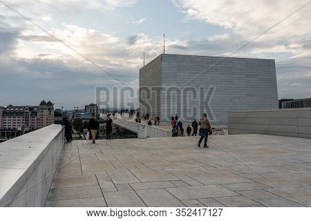Editorial 08.31.2019 Oslo Norway People Looking At The Spectacular Architecture Of The Opera House