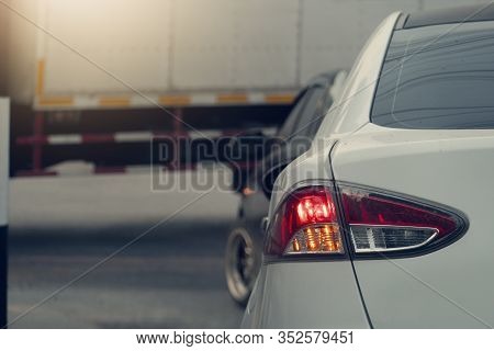 Transportation Of Cars On The Road. Open Light Brake Waiting To The Front Cars Make A U-turn. Headin