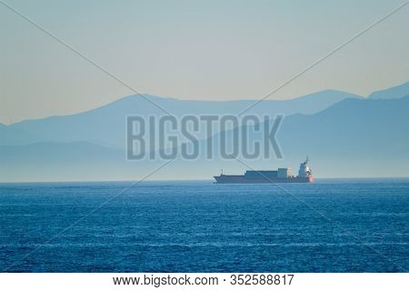 Cargo vessel ship in Aegean Sea Mediterranean sea. Greece